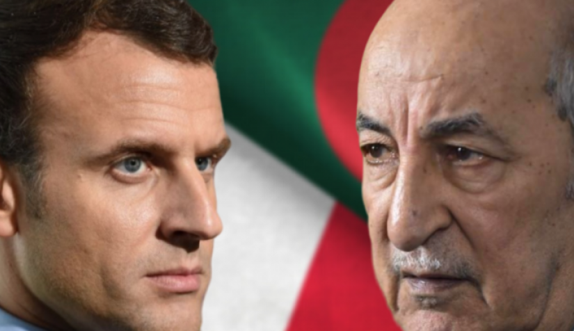 رئيس فرنسا ماكرون ورئيس الجزائر تبون مع أعلام بلديهما
